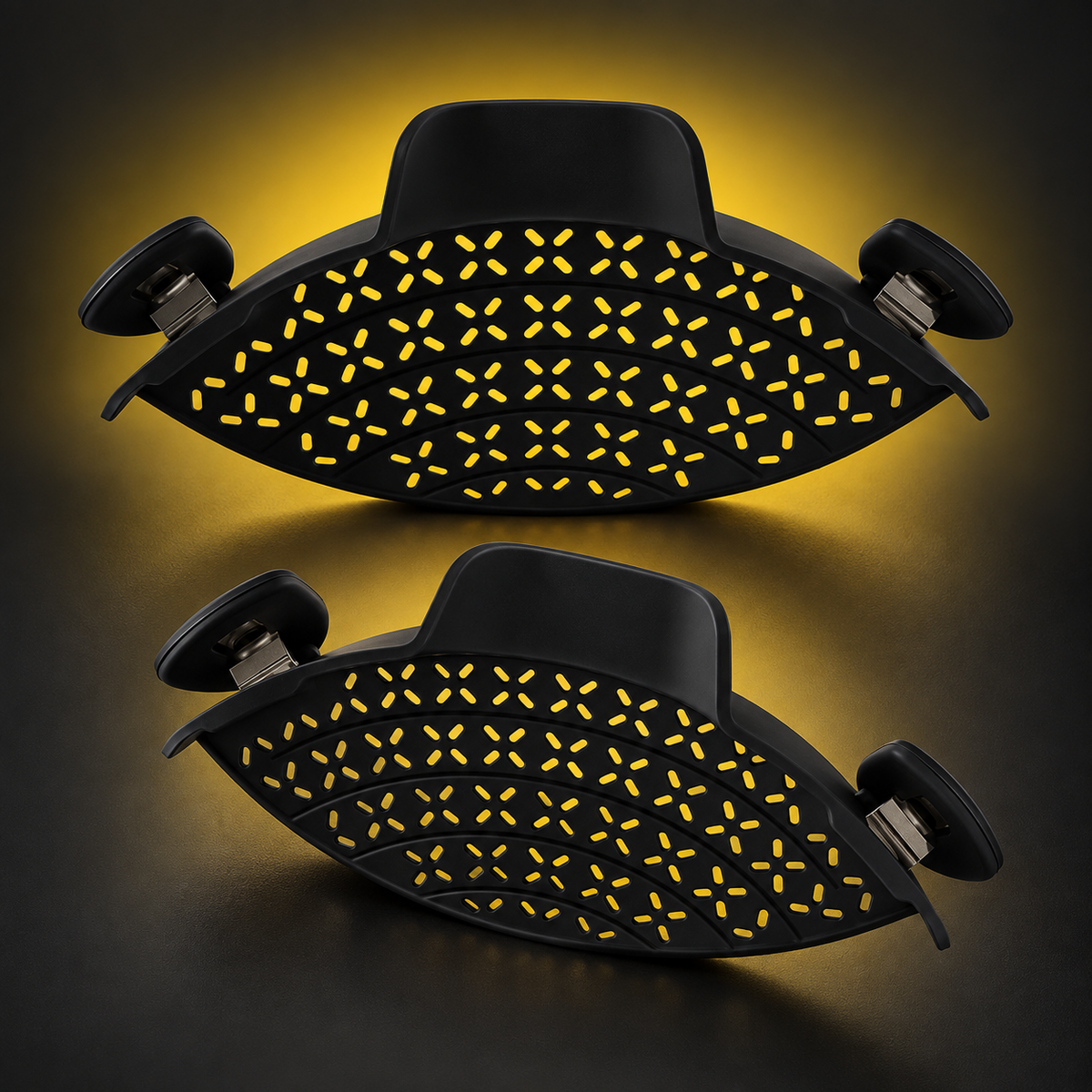 Two black clip-on pot strainers on a black and yellow background