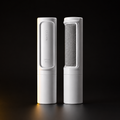 Reusable pet hair remover on a black background